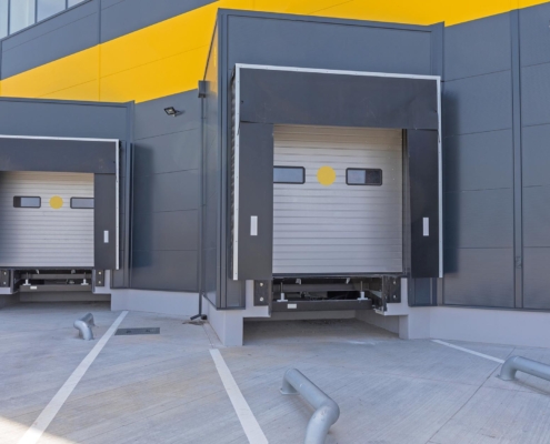 Loading dock at warehouse with truck bumpers