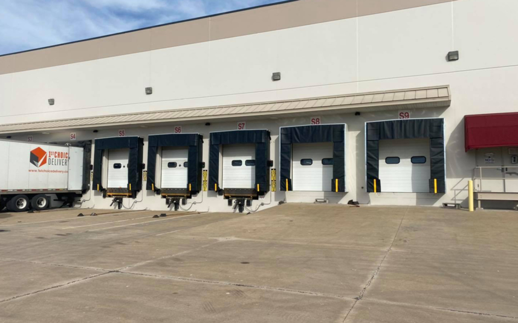 Commercial loading docks with truck bays at Kodiak Equipment Services.