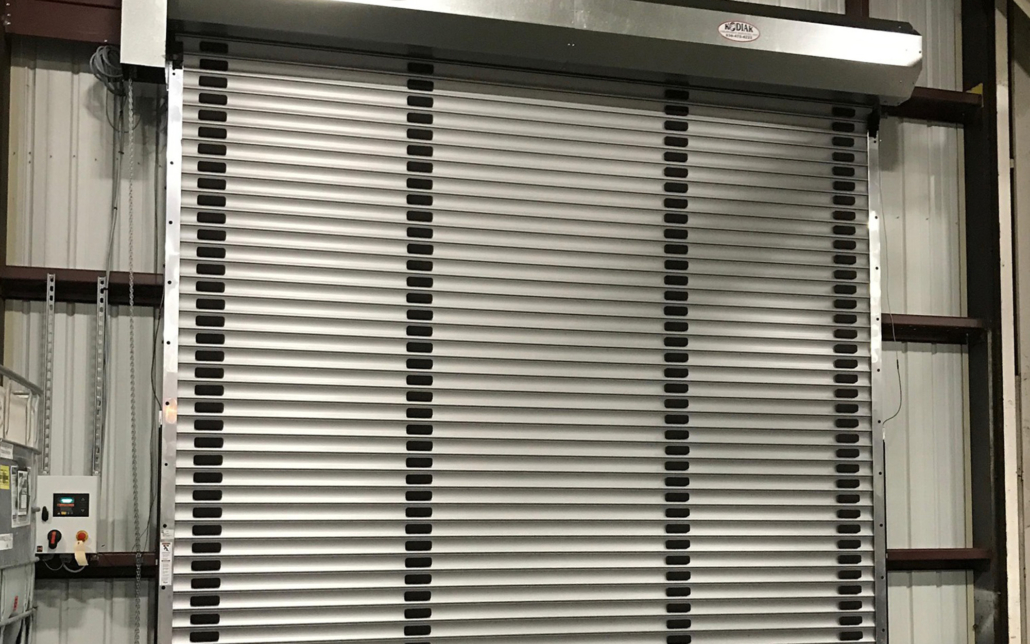 Heavy-duty roll-up door used for industrial and commercial access.