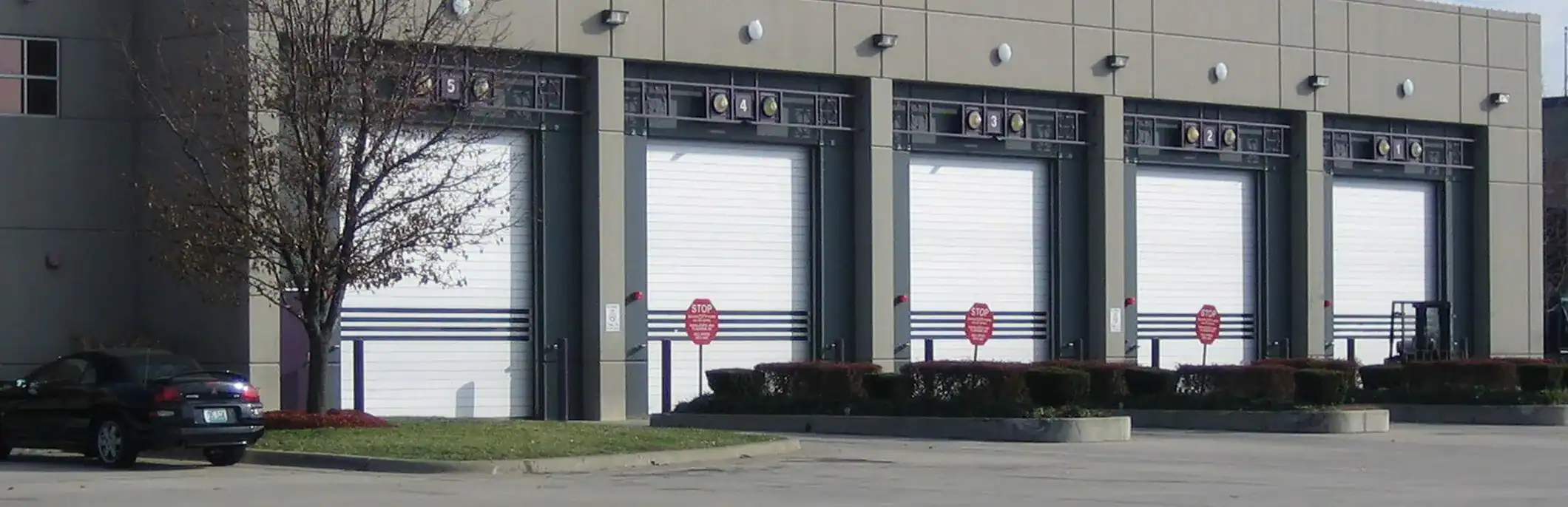 Commercial garage doors at Kodiak Equipment Services in St Louis.