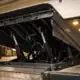 Dock leveler maintenance and repair: the complete guide Heavy-duty loading dock leveler in a warehouse for repair services.