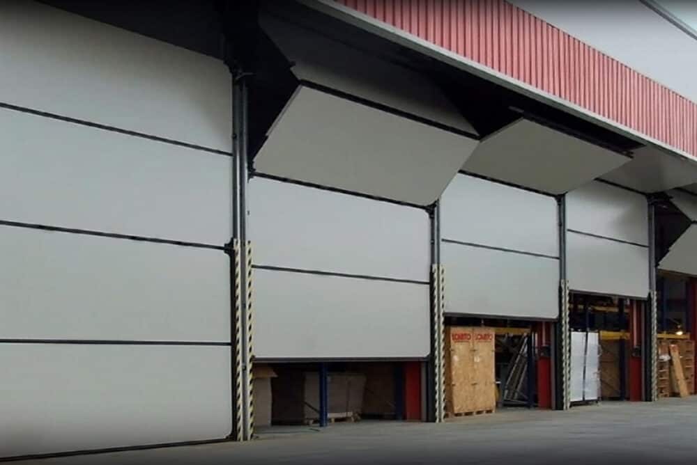 Commercial garage doors being repaired at Kodiak Equipment Services.